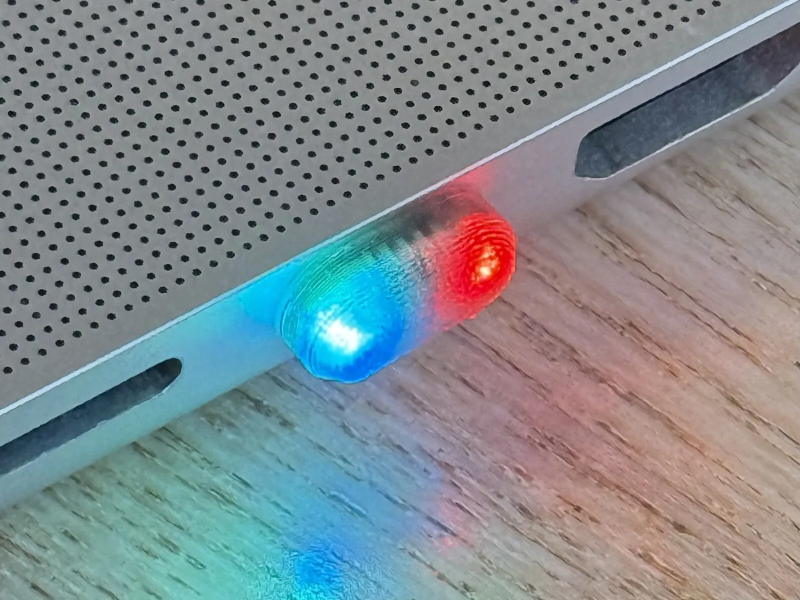 SidePulse Dot glowing in a MacBook USB-C port